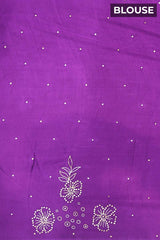 Purple fabric with white floral patterns and 'BLOUSE' text at the top.