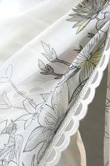 Snow White Organza Silk Saree with Floral Prints And Scalloped Border