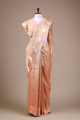 Beige saree with a blouse on a mannequin draped like Nita Ambani Wedding look