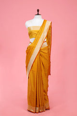 This Yellow Traditional Handloom Katan Silk Banarasi Saree is a wedding saree and festive wear saree. Free Shipping Available!