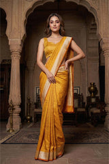 This Yellow Traditional Handloom Katan Silk Banarasi Saree is a wedding saree and festive wear saree. Free Shipping Available!