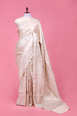 This Off-White Satin Saree with Water-Gold Zari is a wedding saree and festive wear saree. Free Shipping Available!
