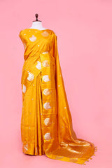 This Yellow Handloom Banarasi Silk Saree with Nandi Motifs is a wedding saree and festive wear saree. Free Shipping Available!