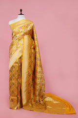 This Deep Yellow Banarasi Katan Silk Saree with Gold Zari Meenakari work is a wedding saree and festive wear saree. Free Shipping Available!