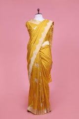 This Yellow Handloom Banarasi Katan Silk Saree with Floral Border is a wedding saree and festive wear saree. Free Shipping Available!