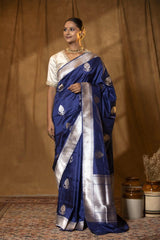 This Navy Blue Katan Silk Banarasi Saree with Gold and Silver Zari Border is a wedding saree and festive wear saree. Free Shipping Available!