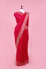 This Magenta Pink Handloom Satin Silk Banarasi Saree with Floral Border is a wedding saree and festive wear saree. Free Shipping Available!
