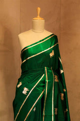 Meenakshi Chaudhary in Bottle Green Banarasi Saree