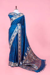 This Teal Blue Banarasi Saree with Rajwada and Nartaki Motifs is a wedding saree and festive wear saree. Free Shipping Available!