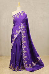 This Purple Banarasi Satin Silk Saree with Meenakari Floral Border is a wedding saree and festive wear saree. Free Shipping Available!