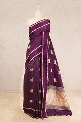 This Purple Silk Banarasi Saree with Pichwai Aghanya Motifs is a wedding saree and festive wear saree. Free Shipping Available!