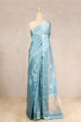 This Sky Blue Banarasi Saree with Pichwai Aghanya Motifs is a wedding saree and festive wear saree. Free Shipping Available!