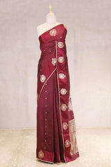 This Maroon Handloom Banarasi Silk Saree with Gayatri Mantra is a wedding saree and festive wear saree. Free Shipping Available!