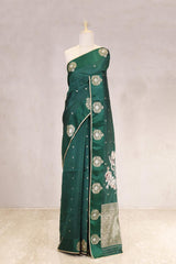 This Bottle Green Handloom Banarasi Silk Saree with Gayatri Mantra is a wedding saree and festive wear saree. Free Shipping Available!