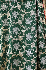 Bottle Green Banarasi Silk Saree with Sona-Rupa Floral Work