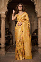 Woman in a Yellow Banarasi Saree standing in an Indian Heritage Muesum with Free Shiipping Available