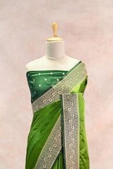 Green Semi Satin Silk Saree with Contrast Red Floral Gold Zari Border