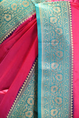 Pink Semi Satin Silk Saree with Contrast Sky Blue Floral Gold Zari Border