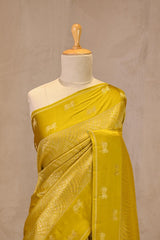 Light Green Viscose Saree with Golden Wave Texture And Pichwai Border