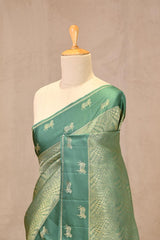 Rama Green Viscose Saree with Golden Wave Texture And Pichwai Border