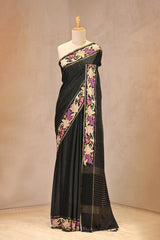 Black Semi Tusser Saree with Zari stripes and Floral Embroidered Border