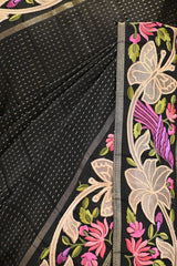 Black Semi Tusser Saree with Zari stripes and Floral Embroidered Border