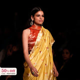 Model wearing a designer silk blouse promoting Diwali sale offer of blouses