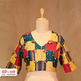 A multicolor designer blouse on a mannequin with a promotional text Diwali sale offer on blouses up to 50%