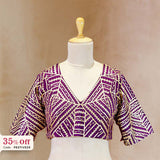 Purple and gold designer blouse with a promotional text Diwali sale offer on blouses up to 50%