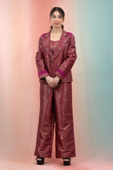 It is a raspberry pink co-ord set in Banarasi silk fabric for party look