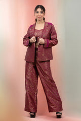 It is a raspberry pink co-ord set in Banarasi silk fabric for party look