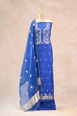 Detailed view of silver zari woven floral yoke on blue Katan silk kurta with silver zari matsya motifs on organza silk dupatta.