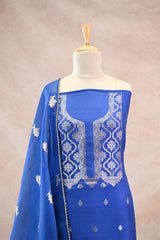 Katan Silk Unstitched Suit Set in Royal Blue with Silver Zari Floral Yoke and Matsya Motif Dupatta