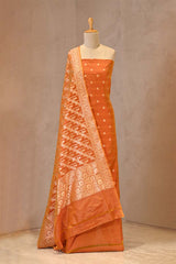 Orange Banarasi Katan silk suit with zari buti and dupatta