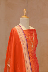 Orange Katan Silk Suit Set With Zari Stripes & Paisely Motif Dupatta
