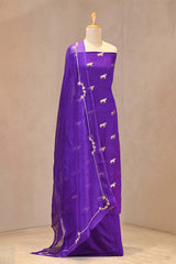 Gold zari woven ethnic ashva motif on purple Chiniya silk unstitched suit set with an embroidered organza dupatta.