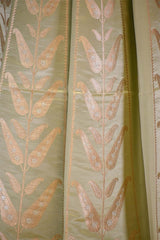 Pistachio Green Satin Silk Bridal Lehenga with Gold and Silver Zari Paisley