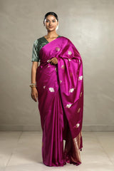 This Magenta Banarasi Silk Saree with Zari Floral Motifs is a wedding saree and festive wear saree. Free Shipping Available!