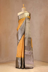 Yellow Chiniya Banarasi Silk Saree with Bandhni Buti and Silver Zari Border