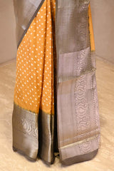 Yellow Chiniya Banarasi Silk Saree with Bandhni Buti & Silver Zari Border