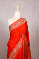 Reddish Orange Handloom Crepe Saree with Shikargah Zari Work