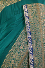 Bottle Green Crepe Silk Saree with Antique Zari Floral Border and Lace