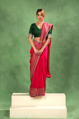 Women wearing of Magenta Pink Crepe Silk Saree for her Sangeet Ceremony