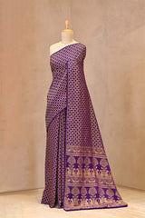 Close up of Purple Crepe Banarasi Khaddi Silk Saree showing gold zari geometrical patterns on the body and antique zari details on the pallu.