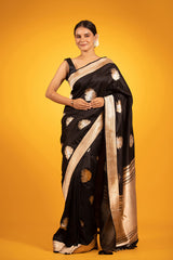 This Black Sonarupa Handloom Katan Silk Banarasi Saree is a wedding saree and festive wear saree. Free Shipping Available!