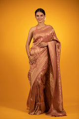 This Rust Peach Geometrical Handloom Katan Silk Banarasi Saree is a wedding saree and festive wear saree. Free Shipping Available!