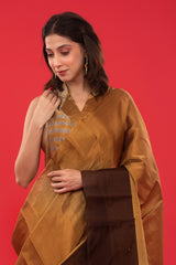 Indian women in Golden Tissue Silk Saree at Chinaya Banaras