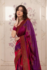 A woman in pink and purple Banarasi raw silk saree