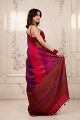 A woman in pink and purple Banarasi raw silk saree