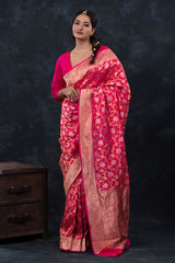 This Pink Handloom Banarasi Saree is a wedding saree and festive wear saree. Free Shipping Available!